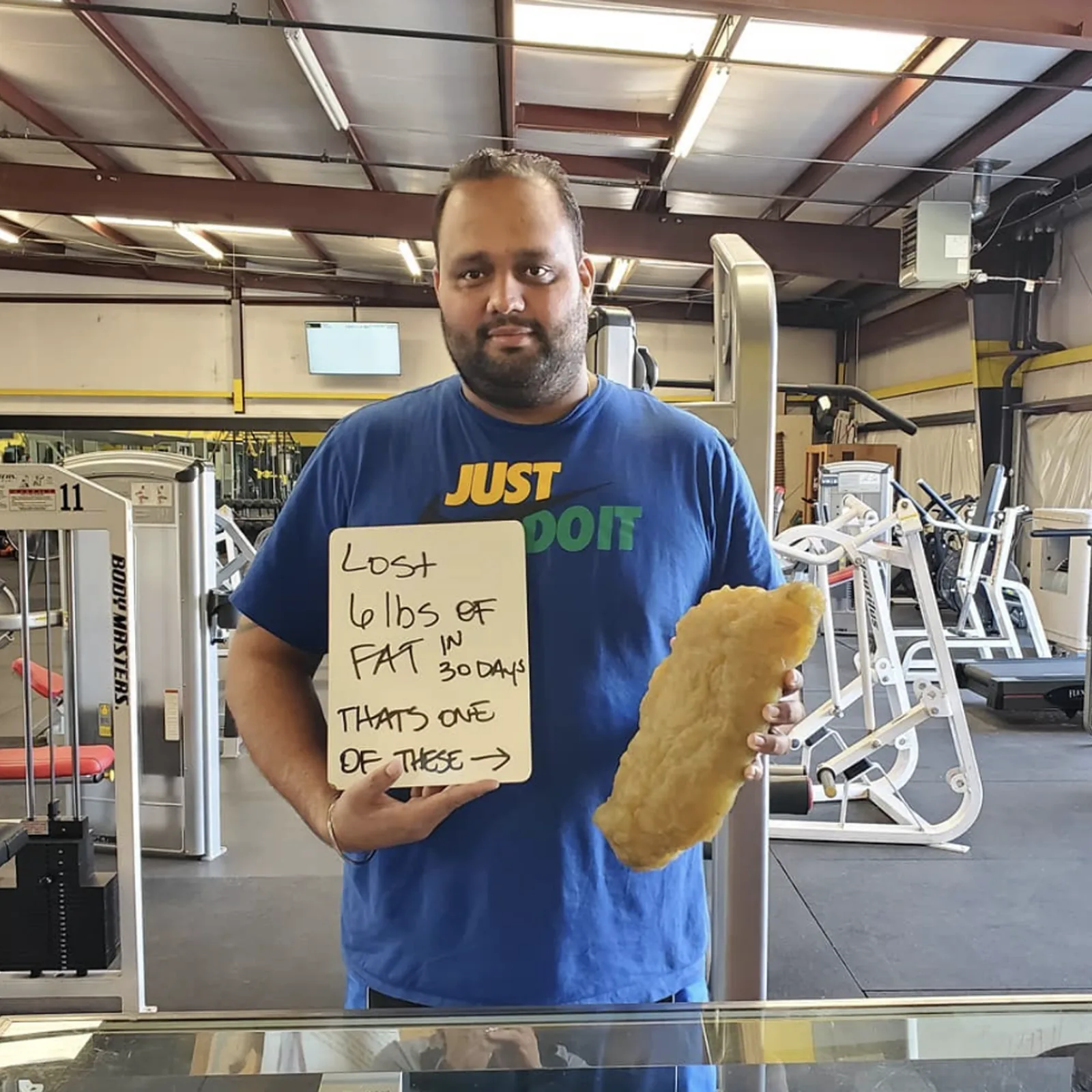 Whiteboard that reads 6 lbs fat lost in 30 days, The Standard, Set it.